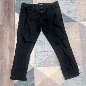 Black distressed RSQ jeans with a slim tapper fit, nice fit, and great martial!